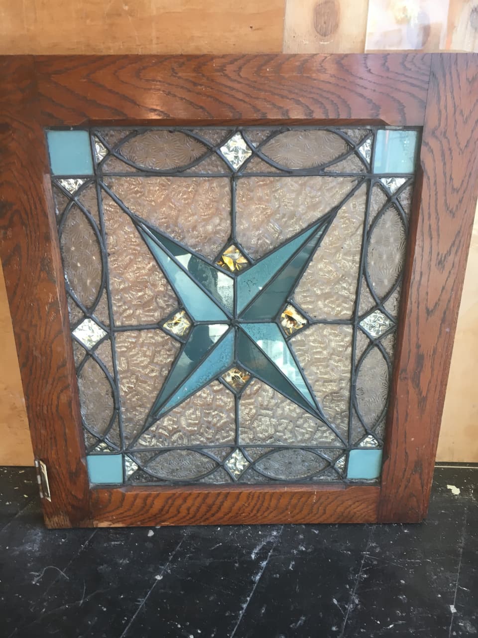 Art Deco star motif leadlight window in a timber frame