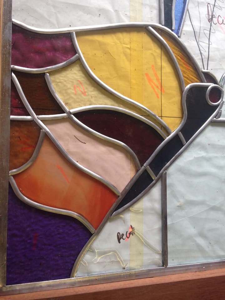 Colourful native bird in leadlight, finished panel in warm oranges and purple