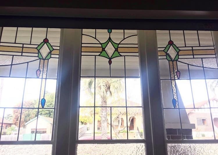 Bank of Federation windows with diamond finials, installed in a hallway