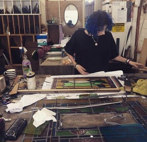 A photograph from the Legacy Stained Glass studio