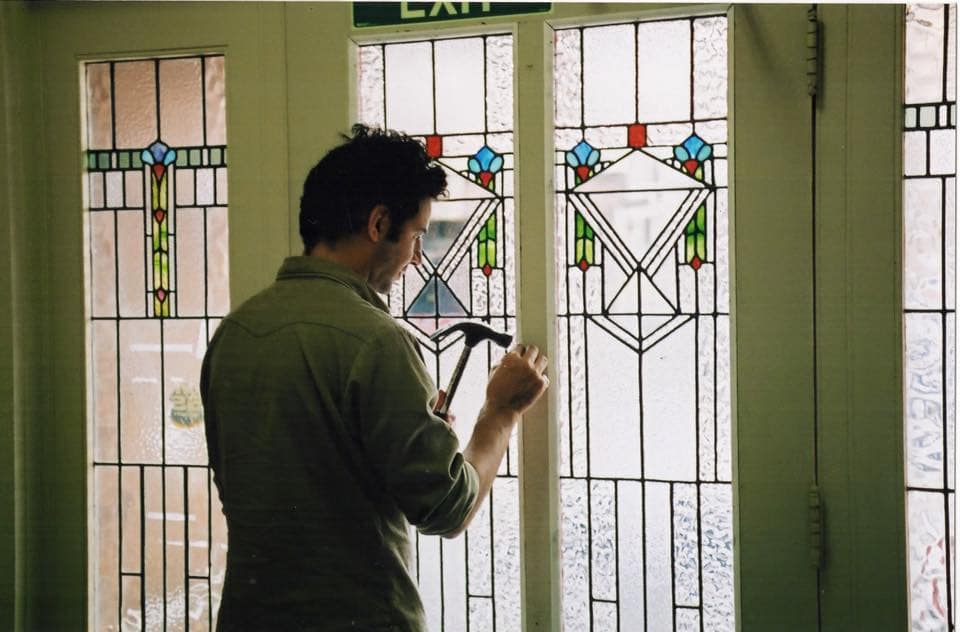A photograph from the Legacy Stained Glass studio