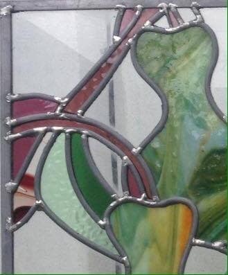 A photograph from the Legacy Stained Glass studio