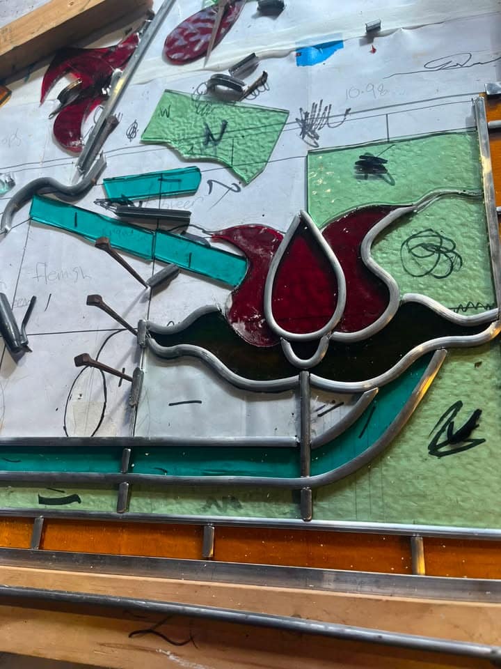 A photograph from the Legacy Stained Glass studio