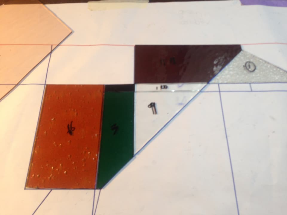 Glass colour selection laid out for a commission on the studio bench