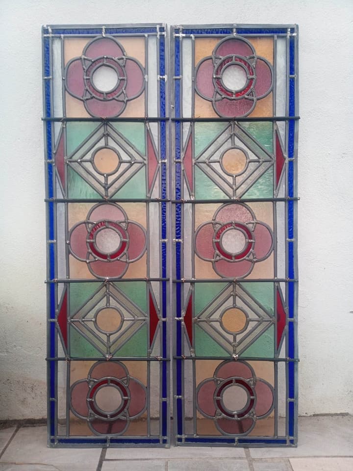 Matched pair of Victorian sidelights with flower medallions in green and pink